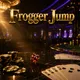 Frogger Jump luxury casino hero banner with gold chips, playing cards, dice on dark marble under cinematic golden and blue li